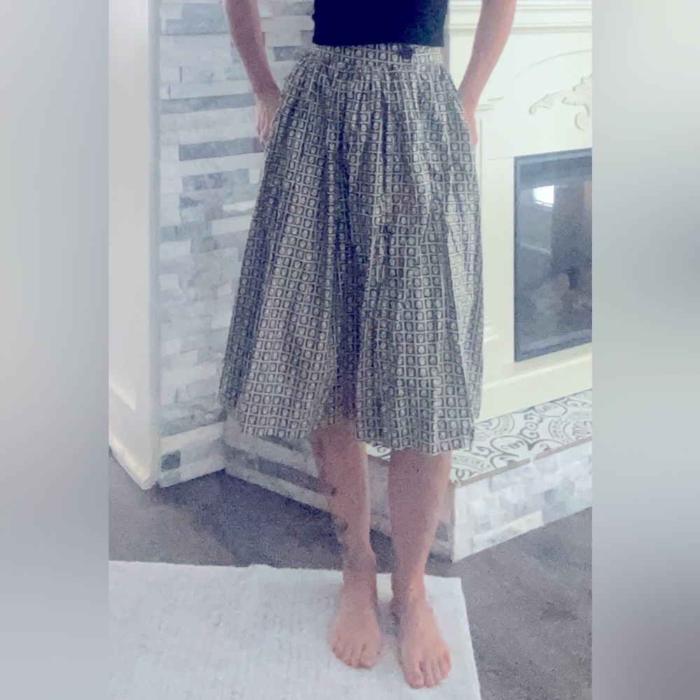 50’s style vintage high waisted skirt with black yellow green and red accents.